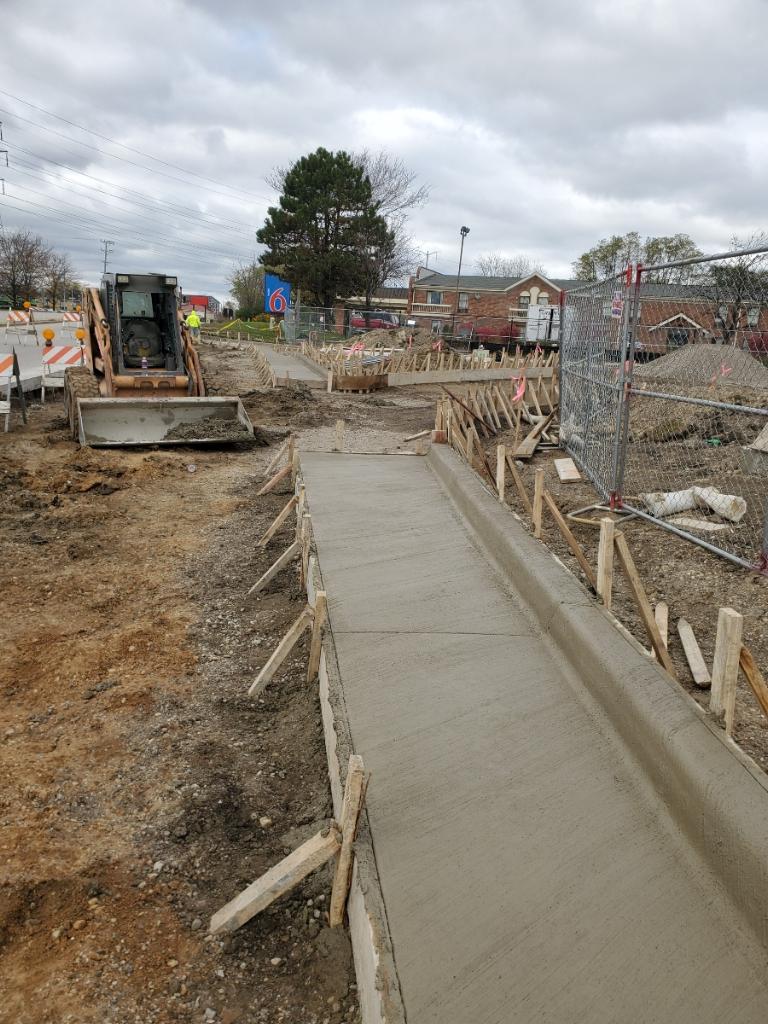 Commercial sidewalk pour along a busy road
